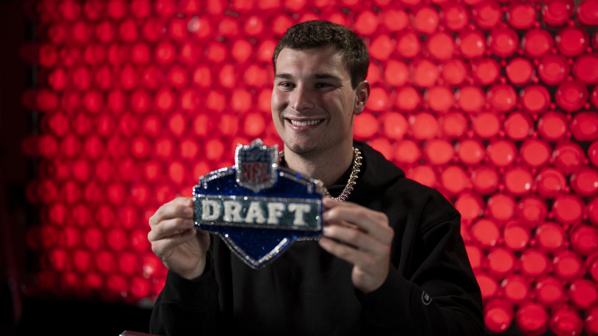 The NFL persuades Peyton Manning to convince Fernando Mendoza to attend the draft.