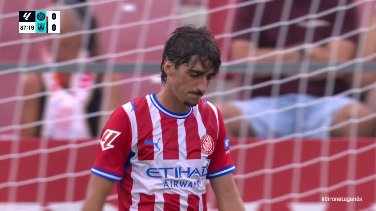 <p>Abel Ruiz scored a last-minute equalizer as Girona secured a 2-2 draw against Leganes in a thrilling La Liga encounter on Saturday.</p> <p>The match looked set for a home victory for Leganes until Ruiz's dramatic 90+3rd-minute strike restored parity, ensuring Girona took a crucial point from the match.</p> <p>Girona had taken the lead through Cristhian Stuani in the 35th minute, but Leganes quickly responded with a goal from Martin Braithwaite just before halftime.</p> <p>The visitors then went ahead through a controversial penalty converted by Braithwaite in the 62nd minute after a VAR review.</p> <p>Ruiz, who came on as a substitute, had the final say, slotting home a cross in stoppage time to salvage a point for Girona.</p>